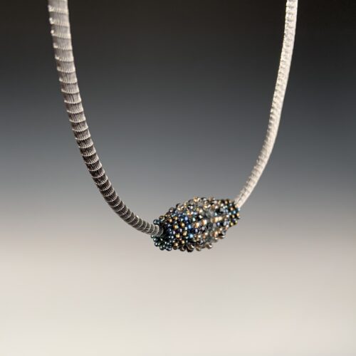 Alternative view of Beaded Barrel Pendant on Woven Cable