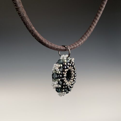 Alternative view of Smoky Beaded Star Pendant