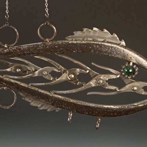 Green-Eyed Metal Fish