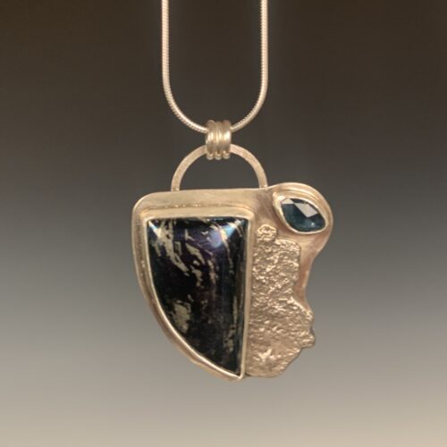 Alternative view of Covellite and Sapphire Pendant