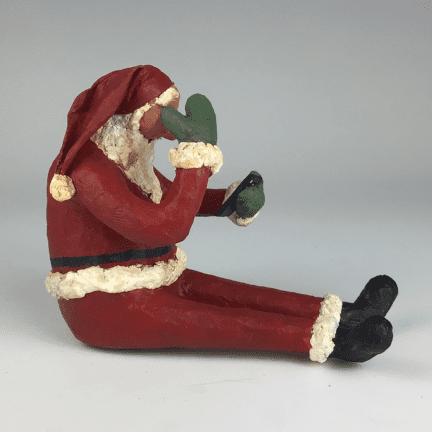 Alternative view of Paper Mache Santa on Cell Phone