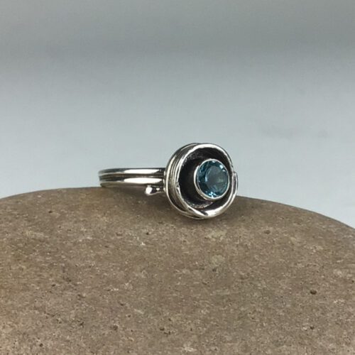 "Empty Nest" Ring with Blue Topaz