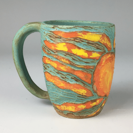 Alternative view of Carved Sun Mug