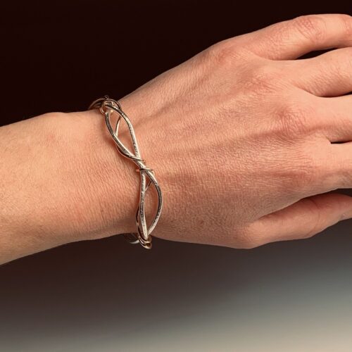 Alternative view of Silver and Gold Swirling Bracelet